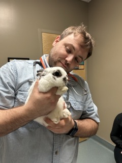 Dr. Kopp holding a rabbit
